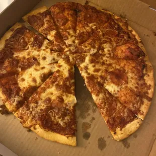 a half eaten pizza in a box
