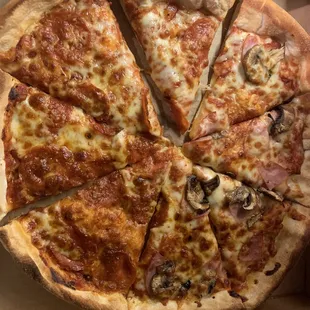 1/2 pepperoni and 1/2 ham with mushrooms