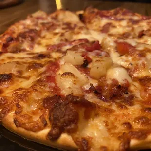 a closeup of a cooked pizza