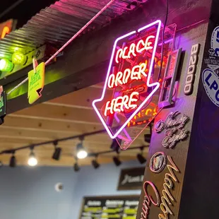a neon sign in a restaurant
