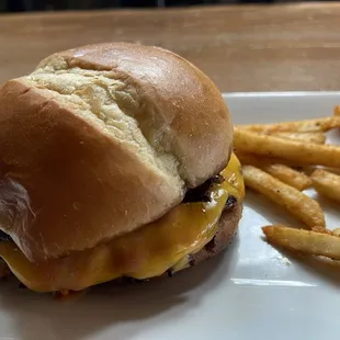 John Candied Bacon Burger - ¼ lb smashed butter burger, double cheese, candied bacon, garlic cheese curds, and homemade special sauce