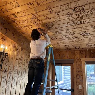 At the end of the week they let you draw out a family brand to burn into the walls or ceiling.