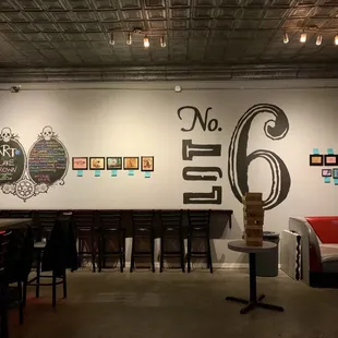 a bar with chairs and tables