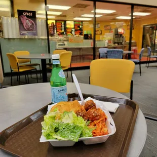 Lots-A-Pasta in background, counter service, you carry your tray to a table that's open.