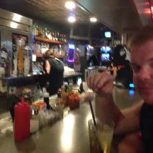 a man sitting at a bar