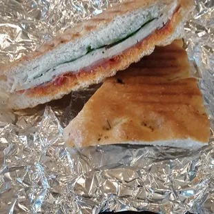 Panini with turkey, Prosciutto, Fontina, sundried tomato pesto and spinach