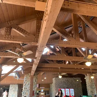 a group of people sitting at picnic tables