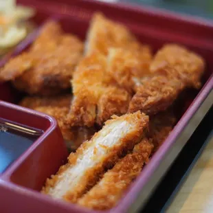 a bento box of food