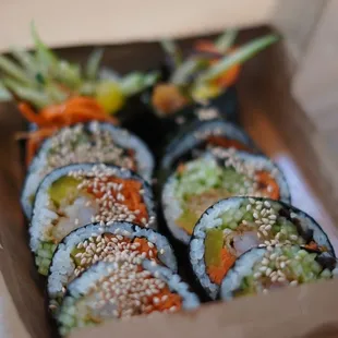 a box of sushi rolls
