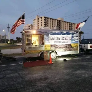 a food truck in a parking lot