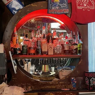 a bar with bottles of liquor