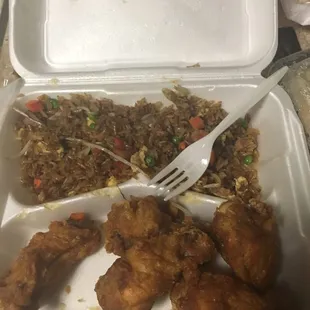 Pork fried rice and chicken wings to go