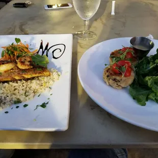 Blackened Red shaper special on left with crab cake entree on the right
