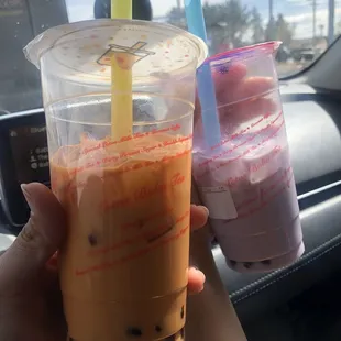 Tiger flavor with boba on the left and a Taro Coconut with boba on the right.