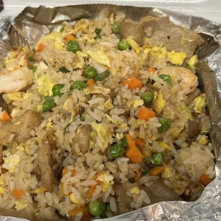chicken fried rice in a foil container