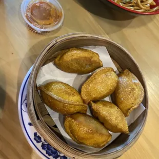 Crispy chicken basil dumplings with dragon sauce