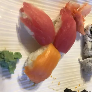 Salmon &amp; Tuna "nigiri", mangled and shredded
