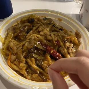 There is an iron wire inside the Pork in Garlic Sauce