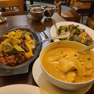 Delicious dinner: Red Curry with Chicken,  Thailand Noodles, and Crispy Duck