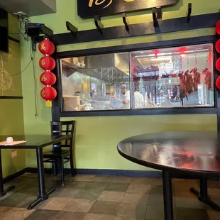 a table and chairs in a restaurant