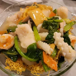 a bowl of noodles and shrimp