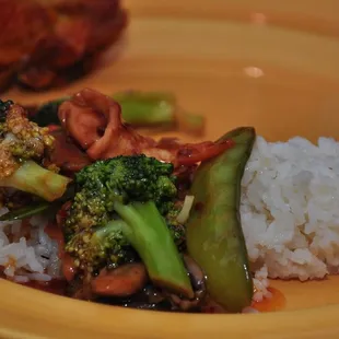 a plate of rice and vegetables