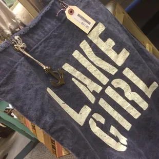 &quot;Lotus Lake&quot;- We&apos;ve gotta have cute lake themed stuff! Tons of fun Lakegirl candles, tote bags, and hats!