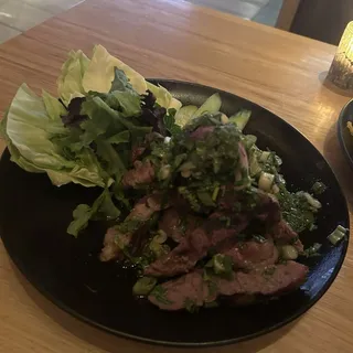 Nua Yang Nua Nam Tok (Ribeye w/ Scallion Lime Sauce)