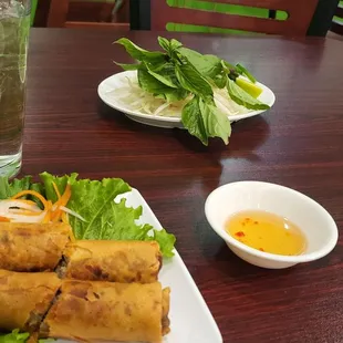 Spring rolls with condiments for the Pho.