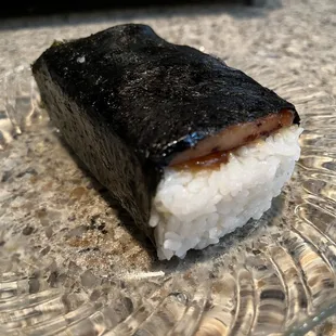 Chicken musubi. Very big--lots of rice. It's not chicken katsu musubi.