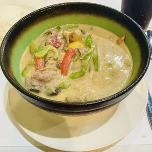 Green Curry: Green Chilies Curry Paste, Coconut Milk, Eggplants, Bell Peppers, Mushrooms, and Thai Basil with Beef.