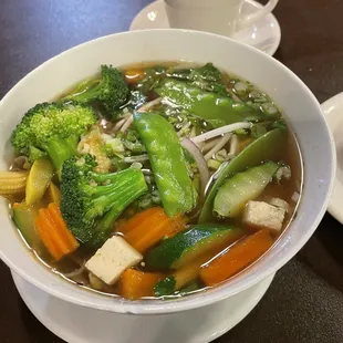 Veggie Pho and my Jasmine Tea saying hi in the back
