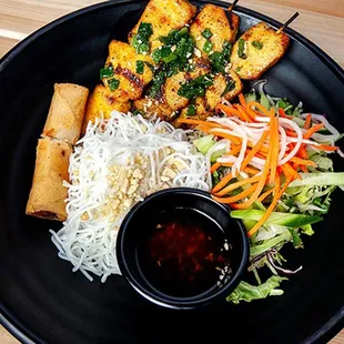Chicken vermicelli bowl with egg roll