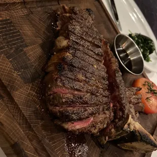 35-day dry aged 18oz Porterhouse Steak cooked Medium Rare