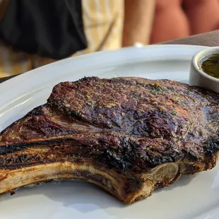 Delicious 20 oz medium rare 120 day dry aged bone in rib eye steak. Celebrating my KETO and IF success dropping 70 pounds in 7 months.