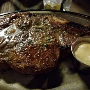 35 day dry aged bone- in rib eye steak