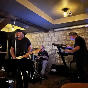 two men playing instruments