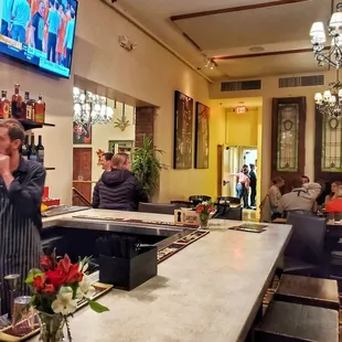 people sitting at a bar