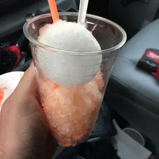 I dumped my snoball in a clear cup just to prove--  they sell you a medium, and the syrup didn't even reach the bottom!?!