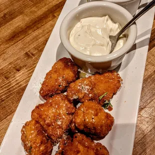 a platter of fried chicken nuggies