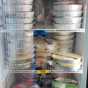 Don't get the frozen pizzas, they don't have the butter crust like the fresh ones. Always get a fresh cooked out par baked