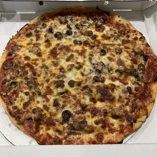 Thin Crust Pizza with sausage, pepperoni, mushrooms and black olives