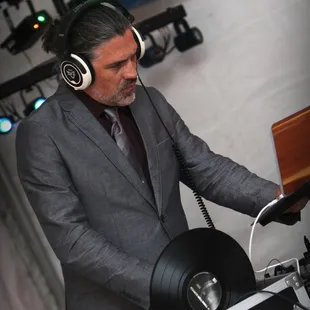 DJ Elixir dusting off the old school vinyl tracks to keep the party going at a recent wedding in Ventura!  Photo credit: Aleasha Aguilar