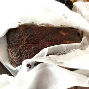 a piece of meat wrapped in paper