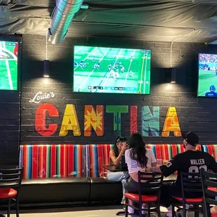 Just a few of the many TV's  that have all the football games on!.