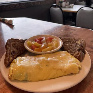 Veggie omelette, fruit and marble rye toast