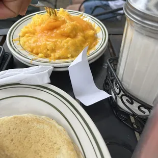 Yellow cheesy grits. We didn&apos;t like them.