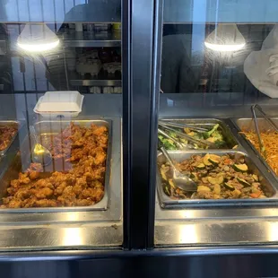 a buffet with a variety of food items