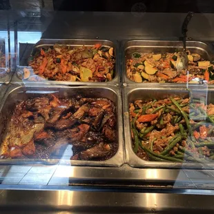 Green bean chicken, mushroom chicken, eggplant and a pother dish.
