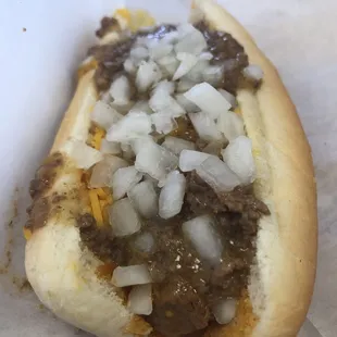 Bake: garlic hamburger meat in hot dog shape. Comes with onion and mustard. Can add cheese. This is their speciality.